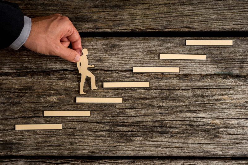 Businessman Climbing The Steps To Success Hzuqufe