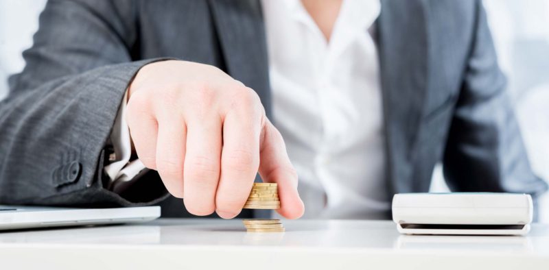 Successful Businessman Counting Money