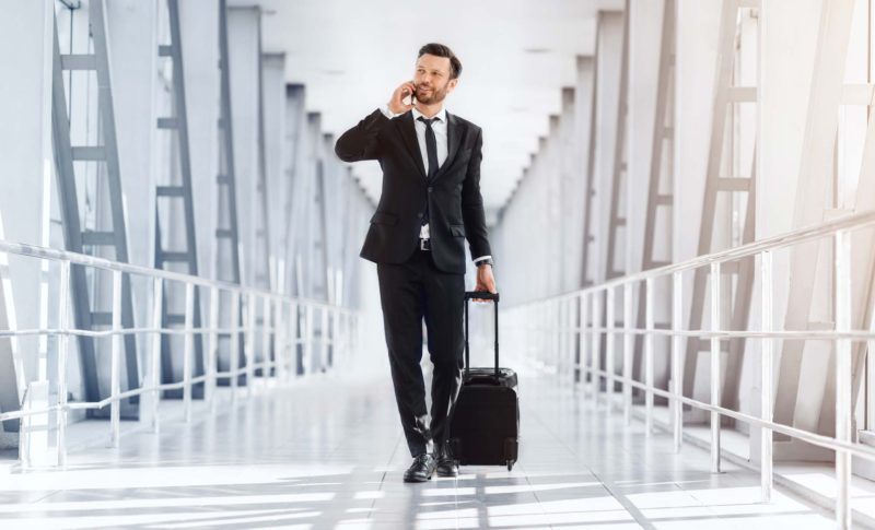 Wealthy Handsome Entrepreneur With Suitcase Walkin